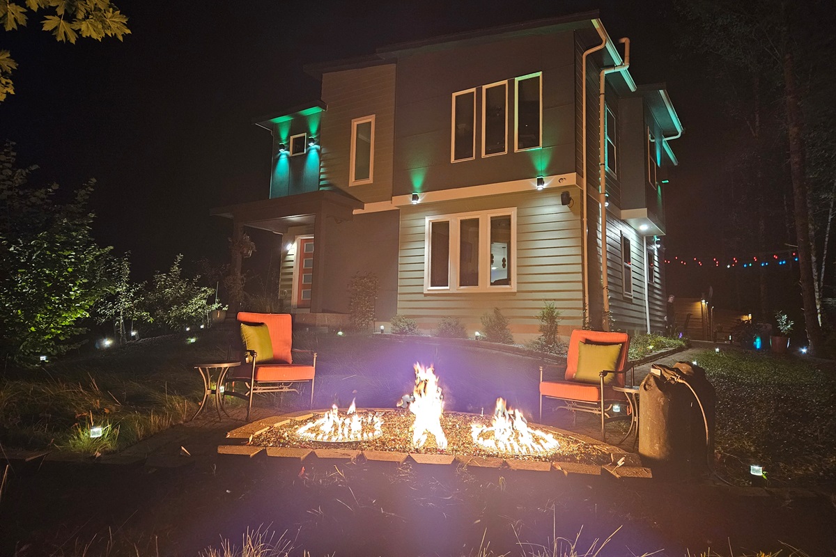 Stone firepit with shimmering fire glass.  Propane firepit is allowed during burn bans.