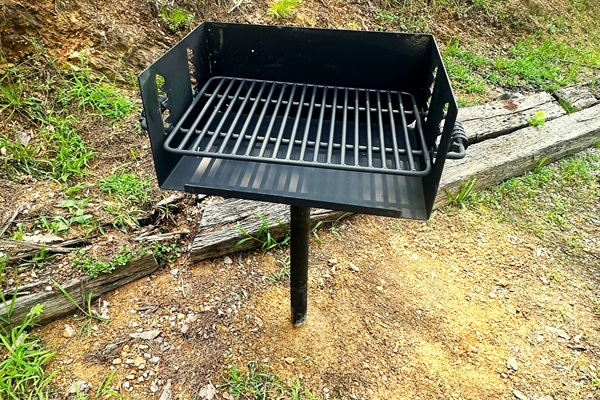 Park Grill for charcoal briquettes (not provided).