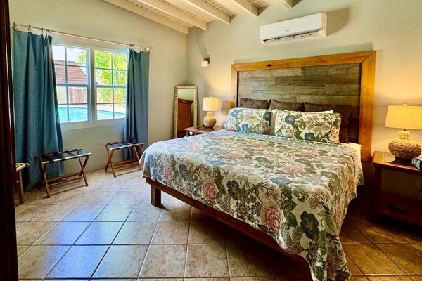 1st Floor Master bedroom with King bed and TV.