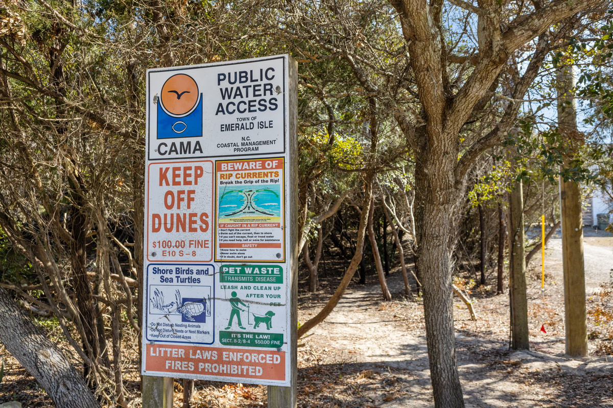 Public beach access entrance with important guidelines for enjoying and protecting the coastal area