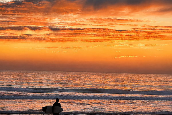 Sunset at the beach beside North Coast Village
