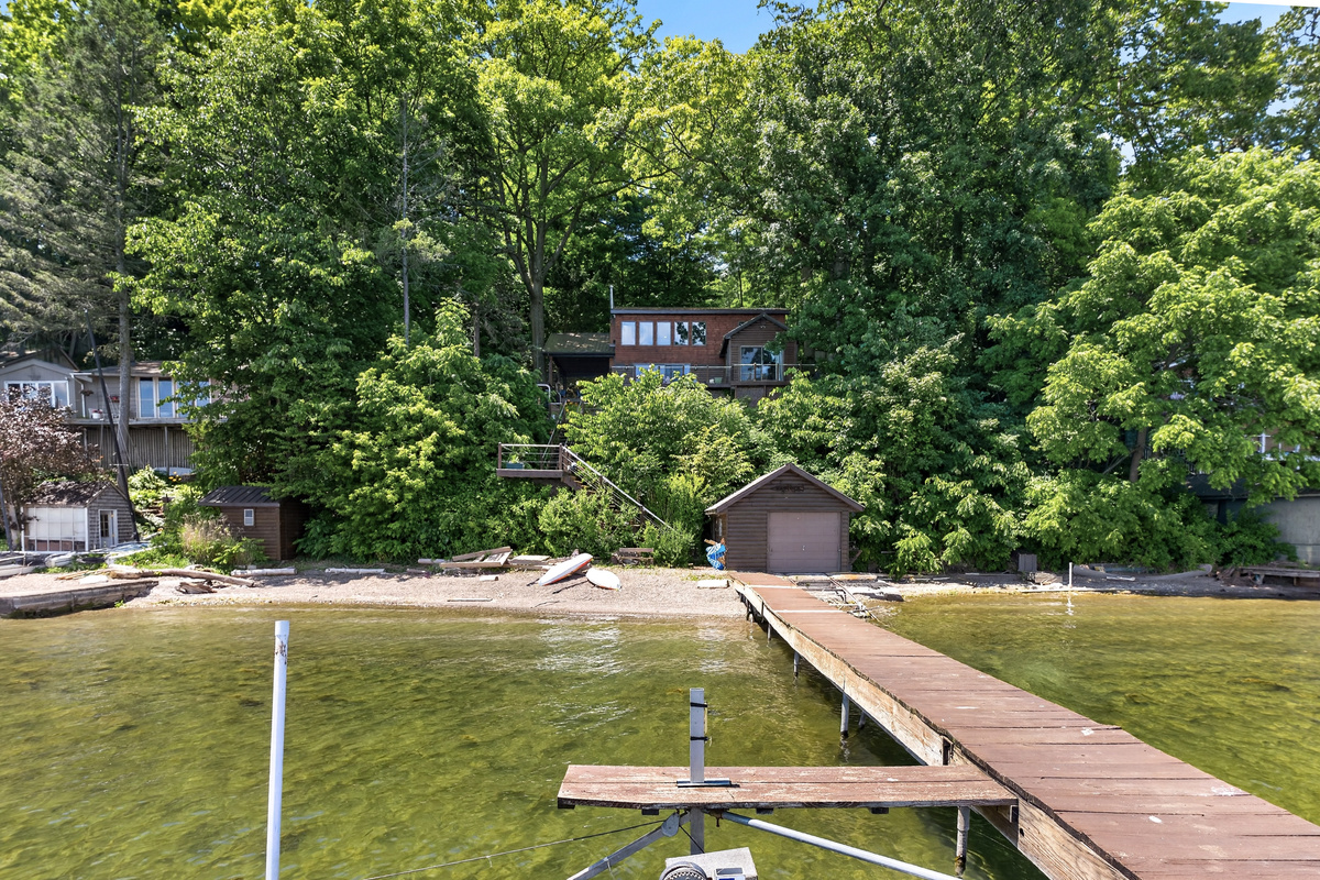 Long deck connecting the shore and property