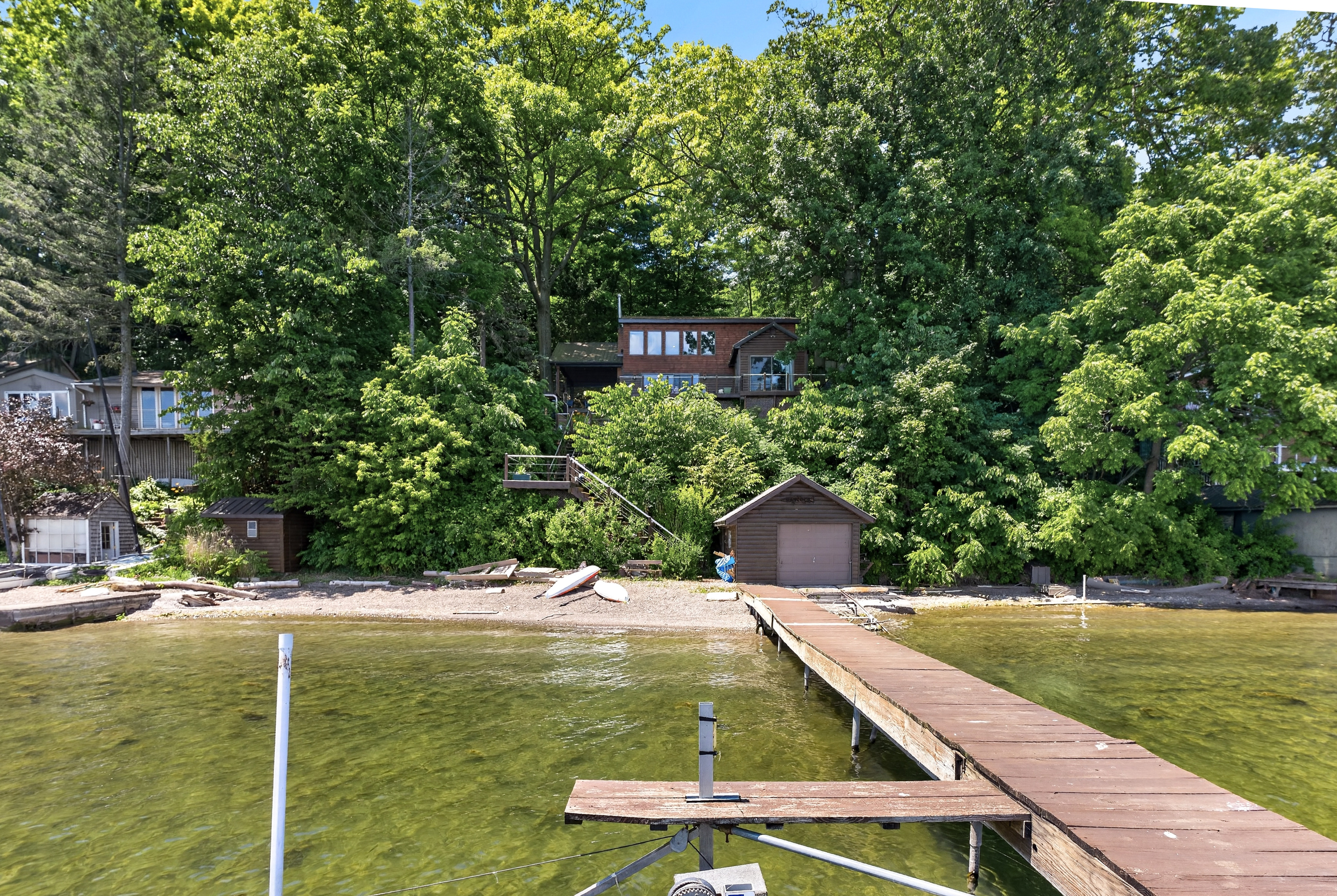 Long deck connecting the shore and property