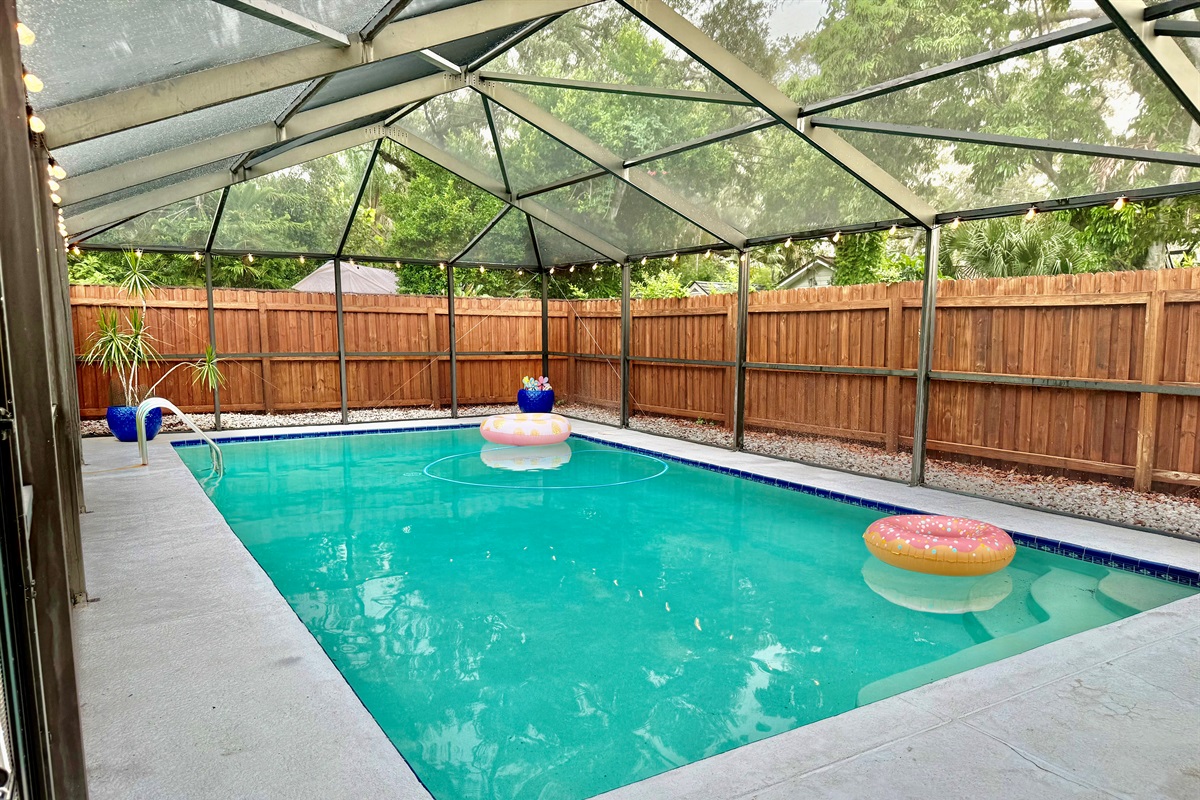 Dive into your own tropical escape—this screened pool offers total privacy and crystal-clear waters all to yourself.