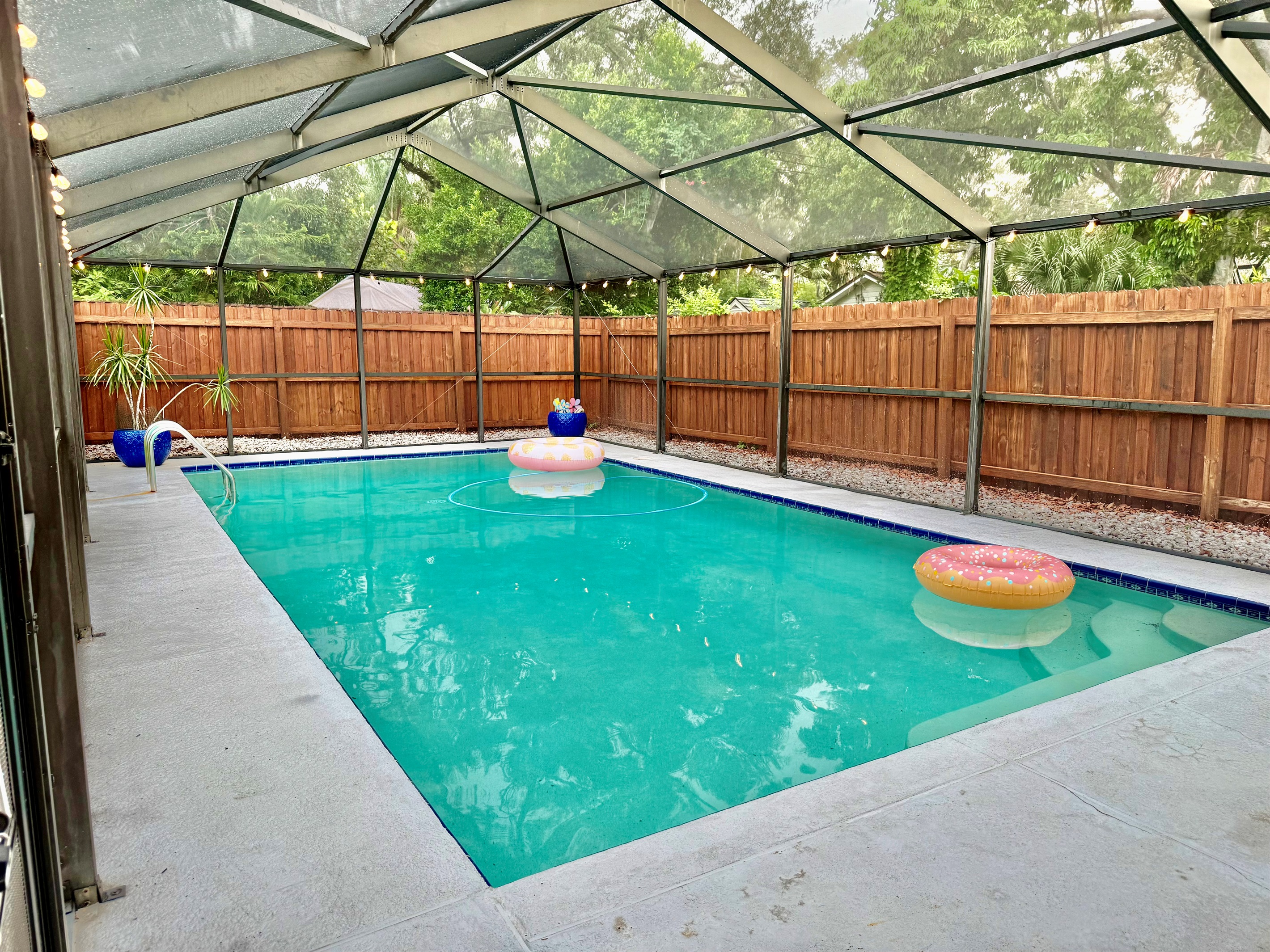 Dive into your own tropical escape—this screened pool offers total privacy and crystal-clear waters all to yourself.