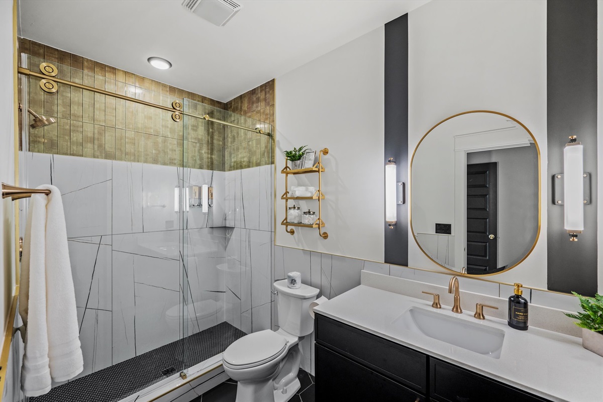 Refresh in your private en-suite sanctuary, offering a seamless walk-in shower!