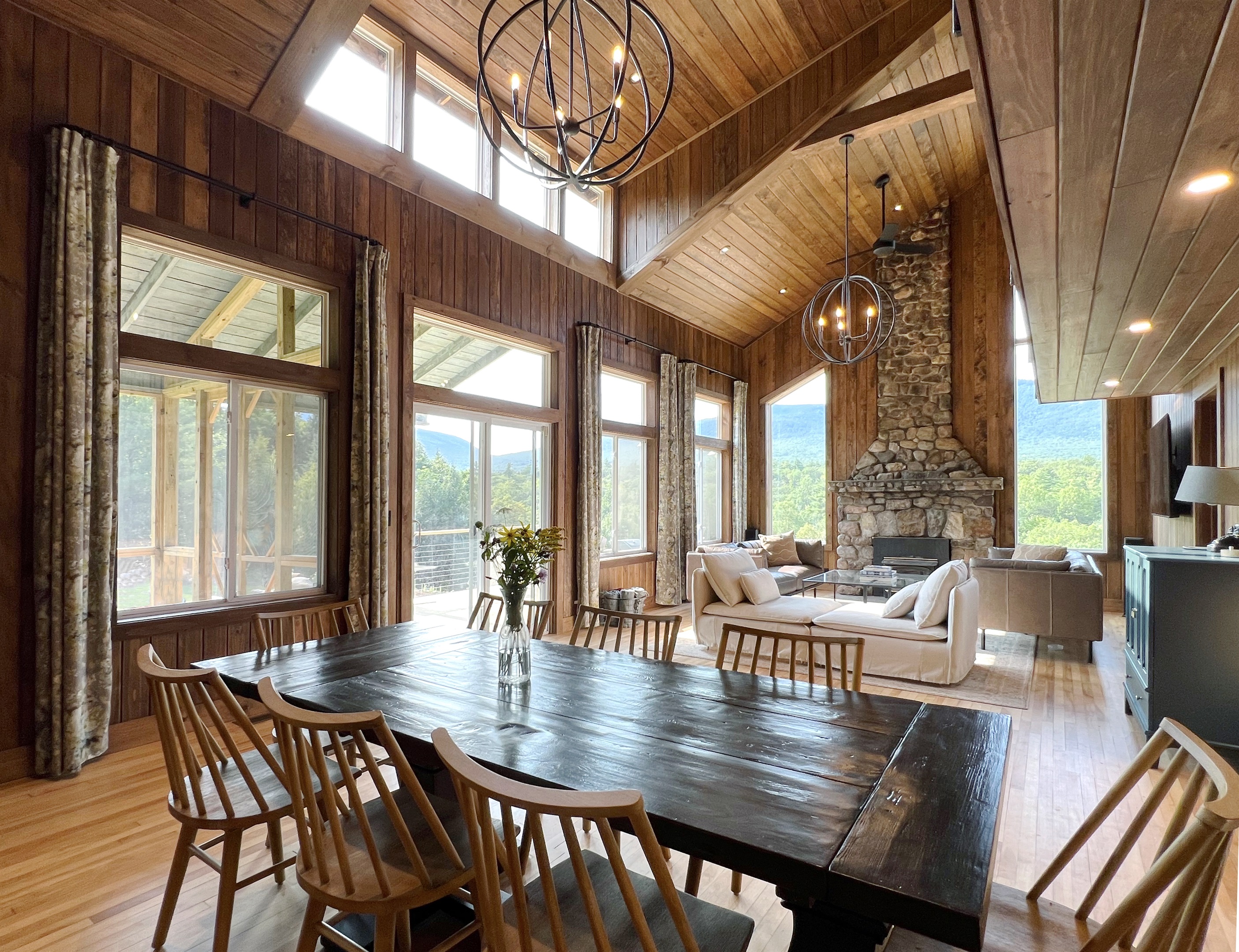 River Ridge Camp’s great room boasts stunning views of the Stephenson Range, with a vaulted, open living plan connecting indoor and outdoor living.