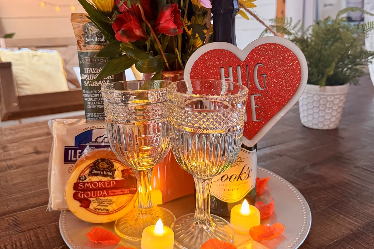 Complete Snack Special Package: Custom Basket with Local Chocolates/Snacks + Bubbly + Rose Pedals on Bed by request.