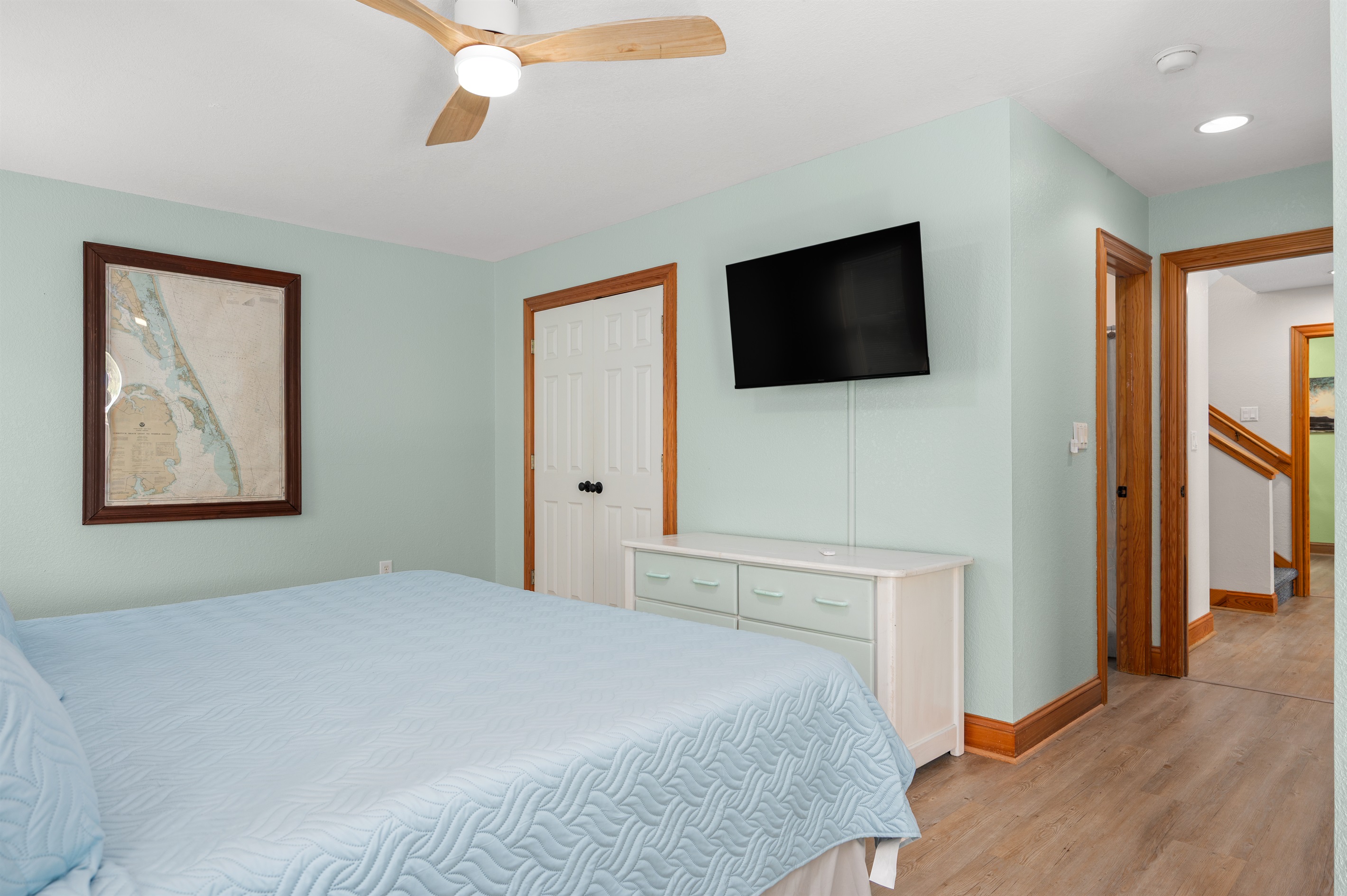Comfortable second-floor king suite featuring Smart TV and plenty of room to unwind.