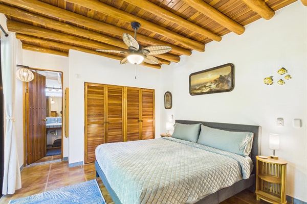 Bedroom 1 with new king bed and brand new mattress.  En suite full bathroom with shower