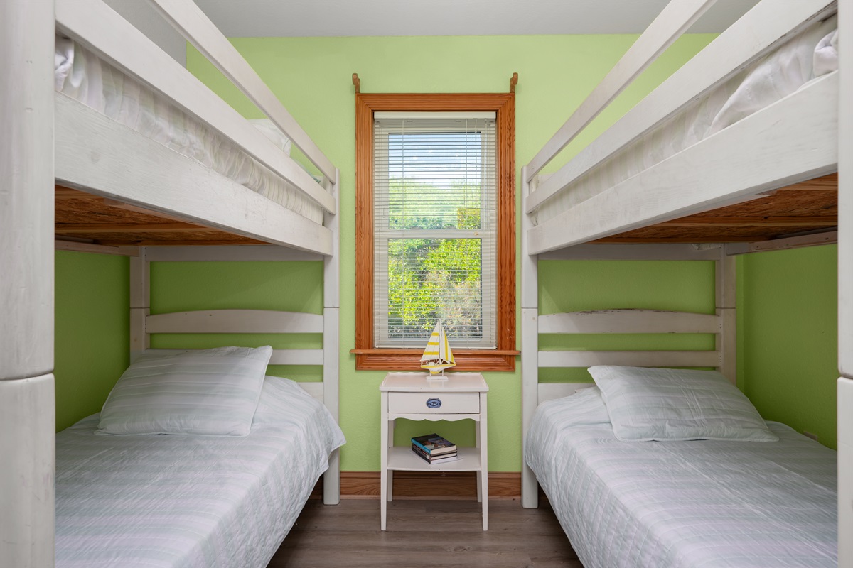 4 twin beds in bunk room 2