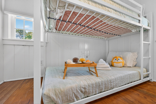 Second bedroom featuring a twin-size bunk bed.