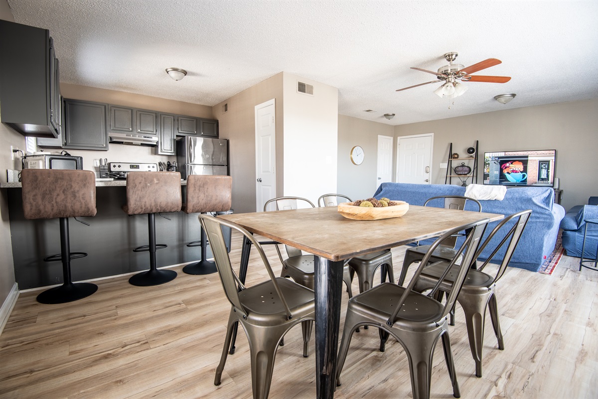 Unit E's dining area also includes extra bar seating with three seats for larger groups and morning chats.