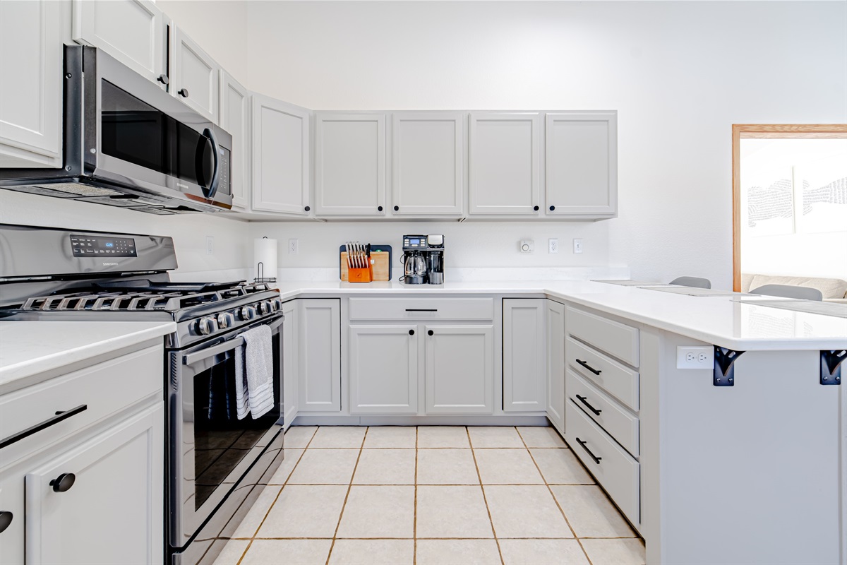 Large updated kitchen that has all the essentials including a started coffee and tea kit. Oil, salt and pepper for guests to use!