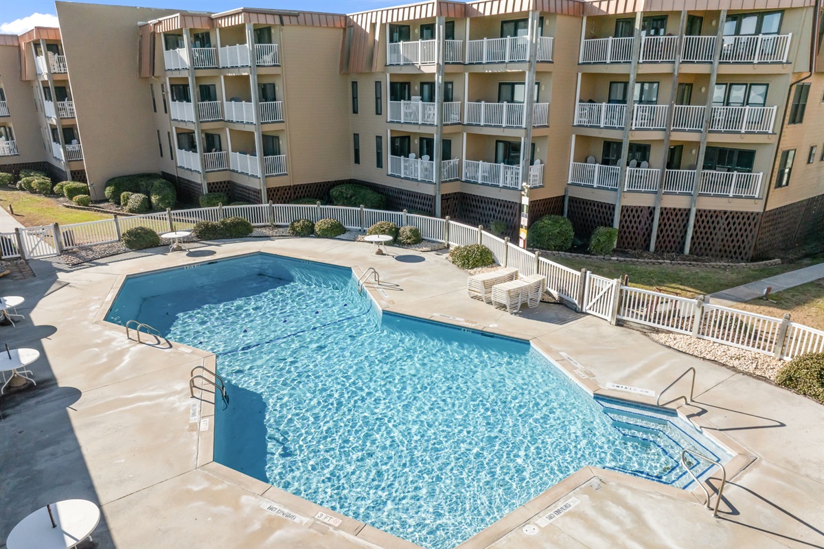 Resort-style pool just steps from your door: perfect for a refreshing dip or lounging in the sun between beach adventures