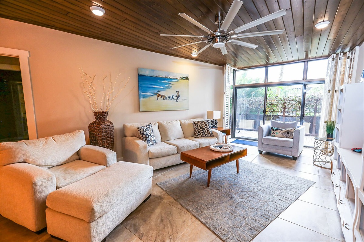 Spacious open-plan living and dining area filled with natural light.