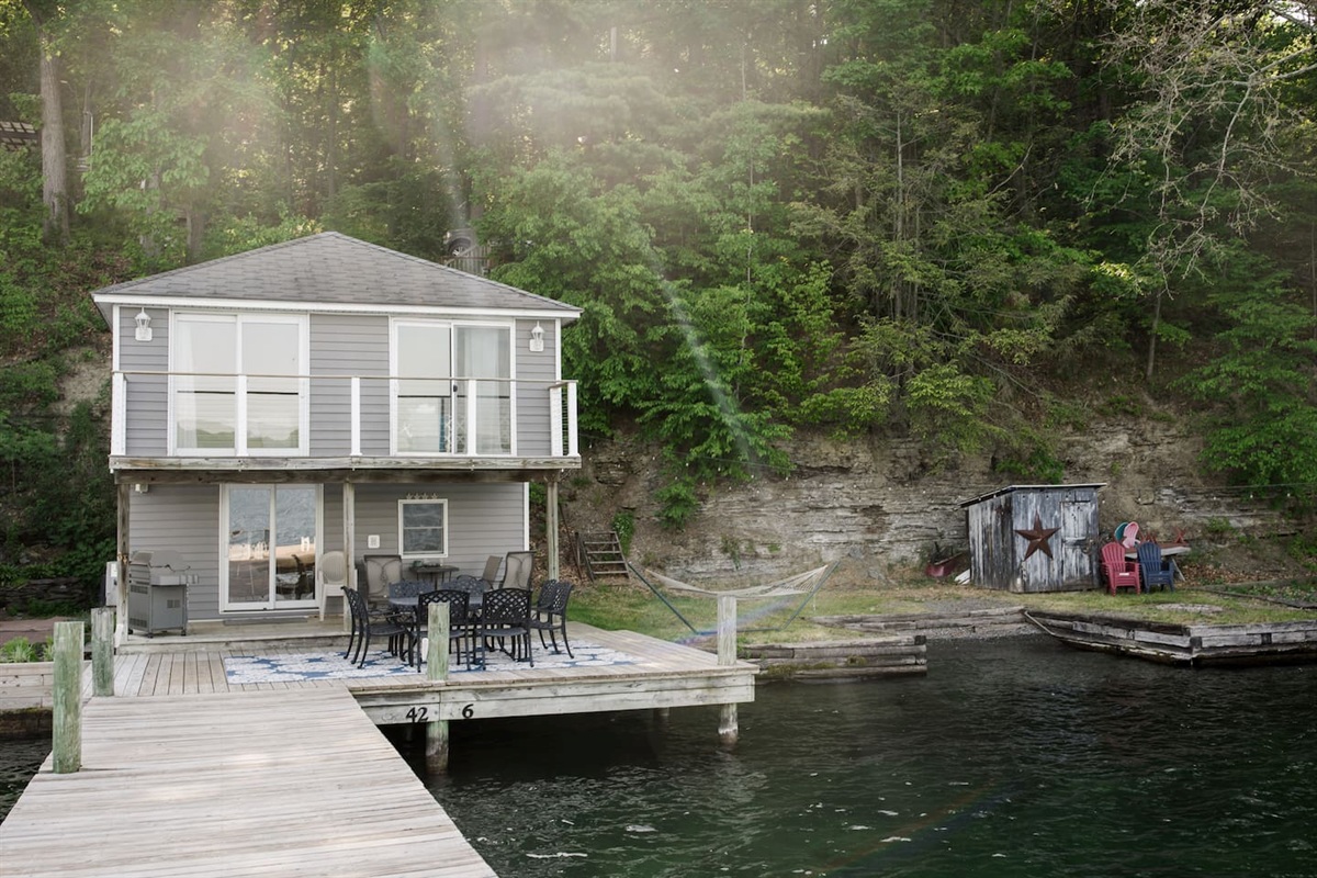 Outside dining, hammock, and swim area