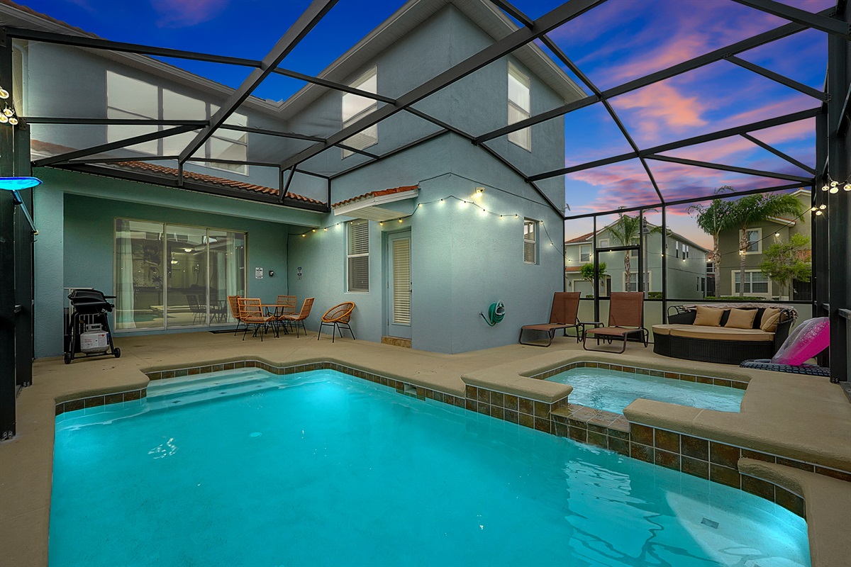 Enclosed saltwater spa and pool lounge area that’s been recently resurfaced, surrounded by privacy screens and optional heating (for a minimal fee)