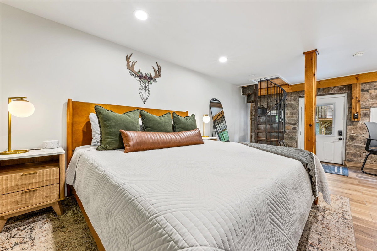 Master Bedroom with King Bed, 42-inch Smart TV, sound machine, blackout curtains and desk with computer monitor.   Full size washer/dryer with detergent provided.