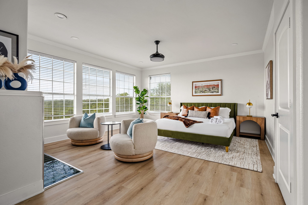 A relaxing primary bedroom offering a comfortable place to unwind.
