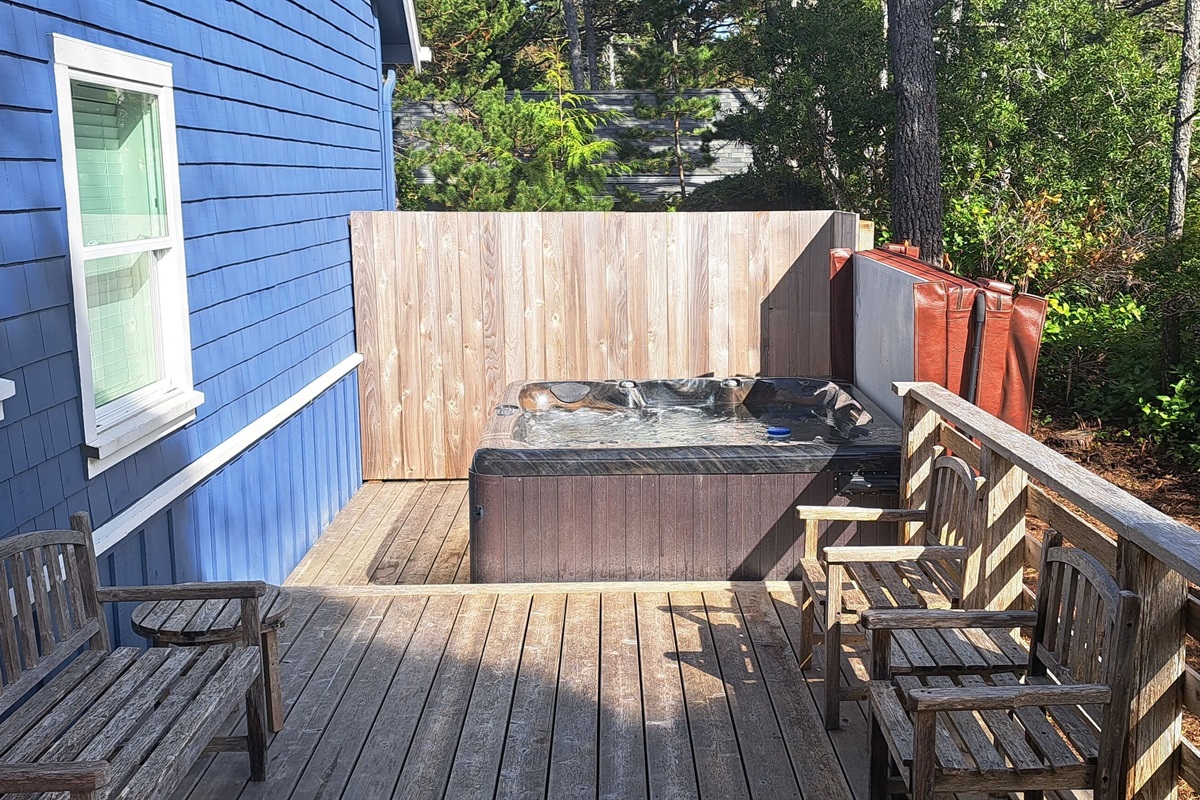 Enjoy a large hot tub ~ perfect for relaxing after a day at the beach!