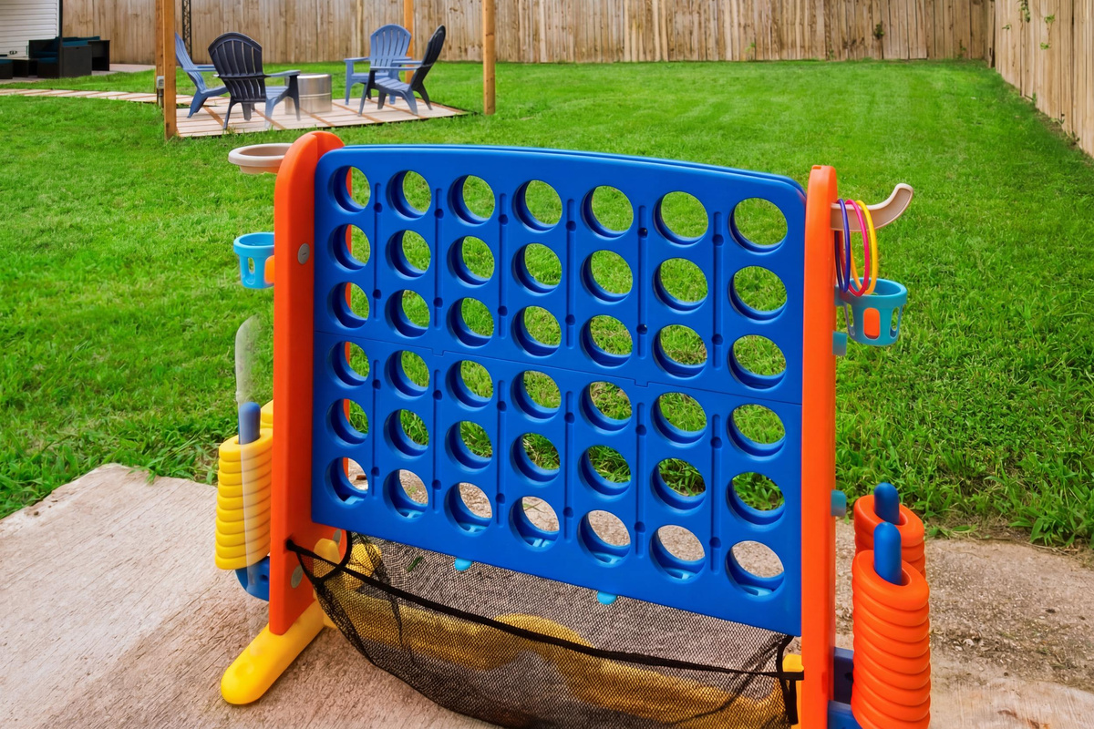 Lifesize Connect Four and Outdoor Games on the patio. Fun for all ages between trips to Six Flags Over Texas and Hurricane Harbor, both a quick drive from the home.