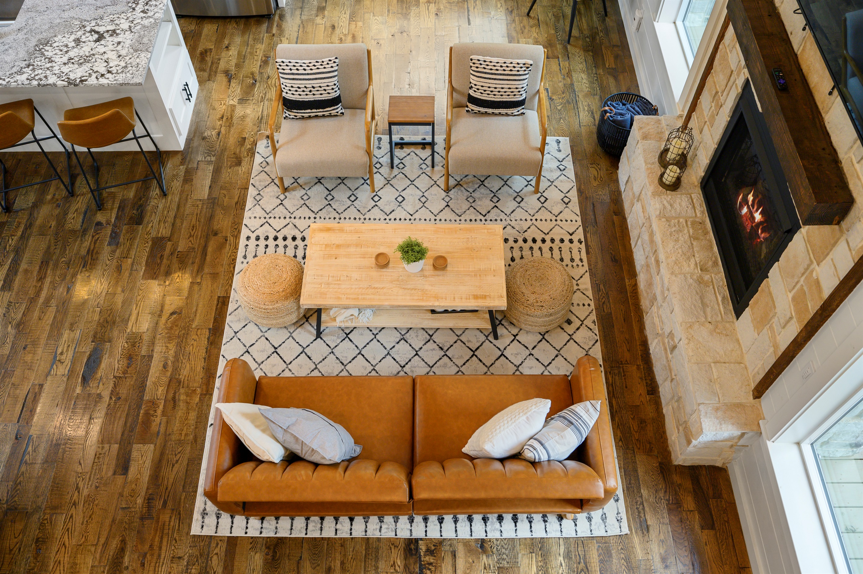 A bird’s eye view of where cabin memories are made.
Living room comfort with a little extra breathing room. 
Open, inviting, and wrapped in warm cabin charm, this is the kind of space where everyone naturally ends up together.
