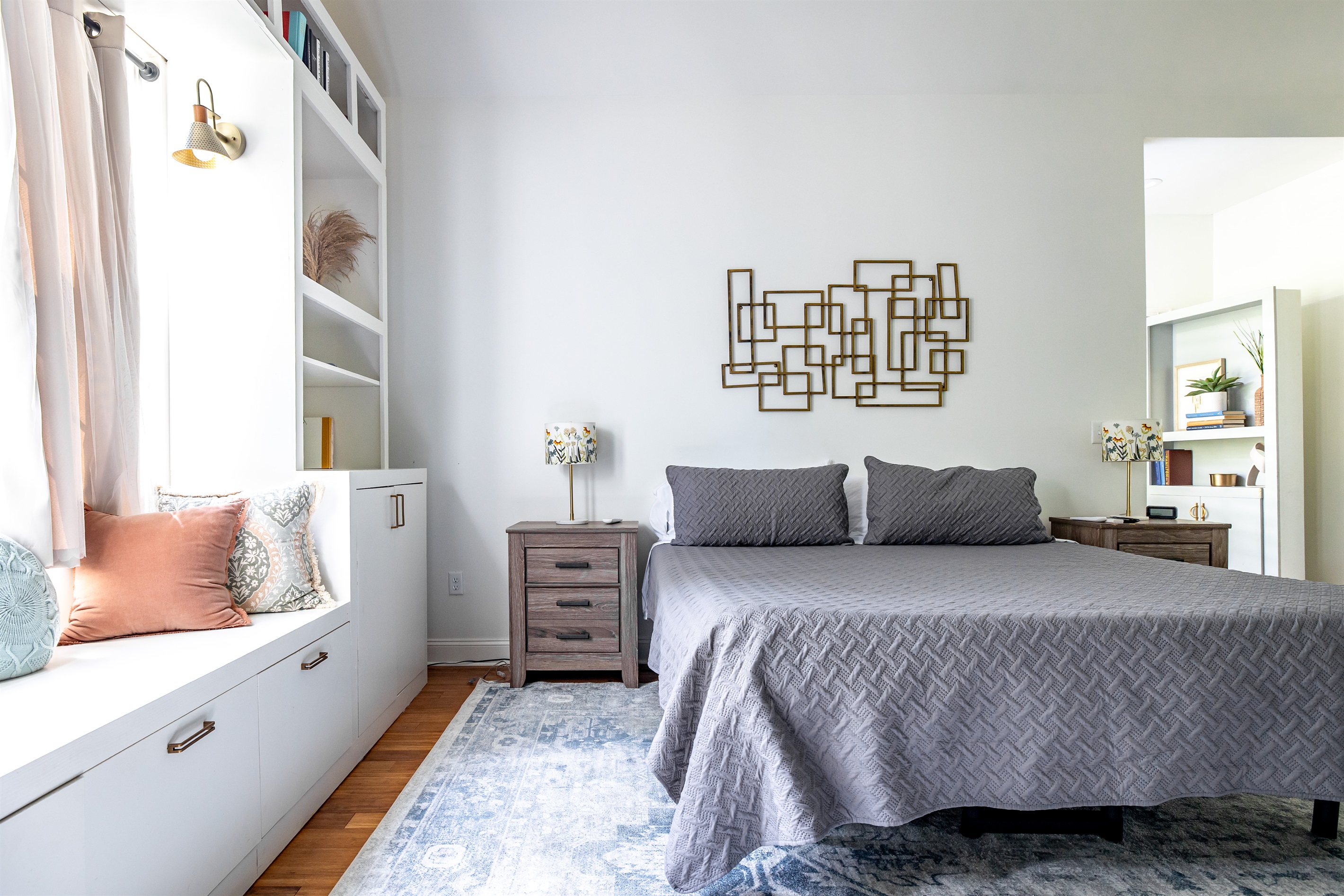 Main bedroom with king bed, TV, desk