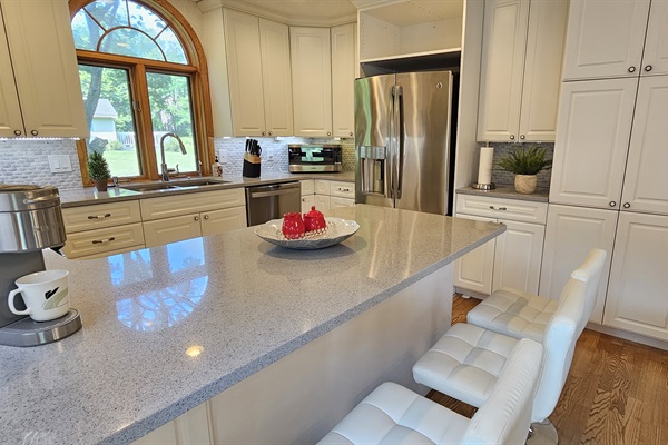 Chef's kitchen with French refrigerator