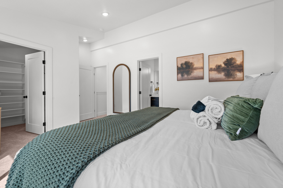 A peaceful bedroom retreat with a clean, modern feel and plenty of room to settle in.