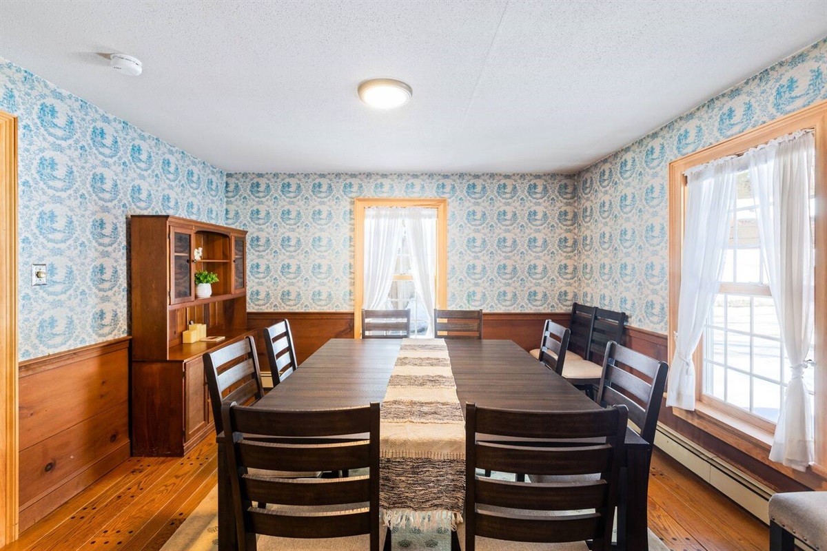 Dining table seats 8+ as shown. 12 with tables pulled apart. 