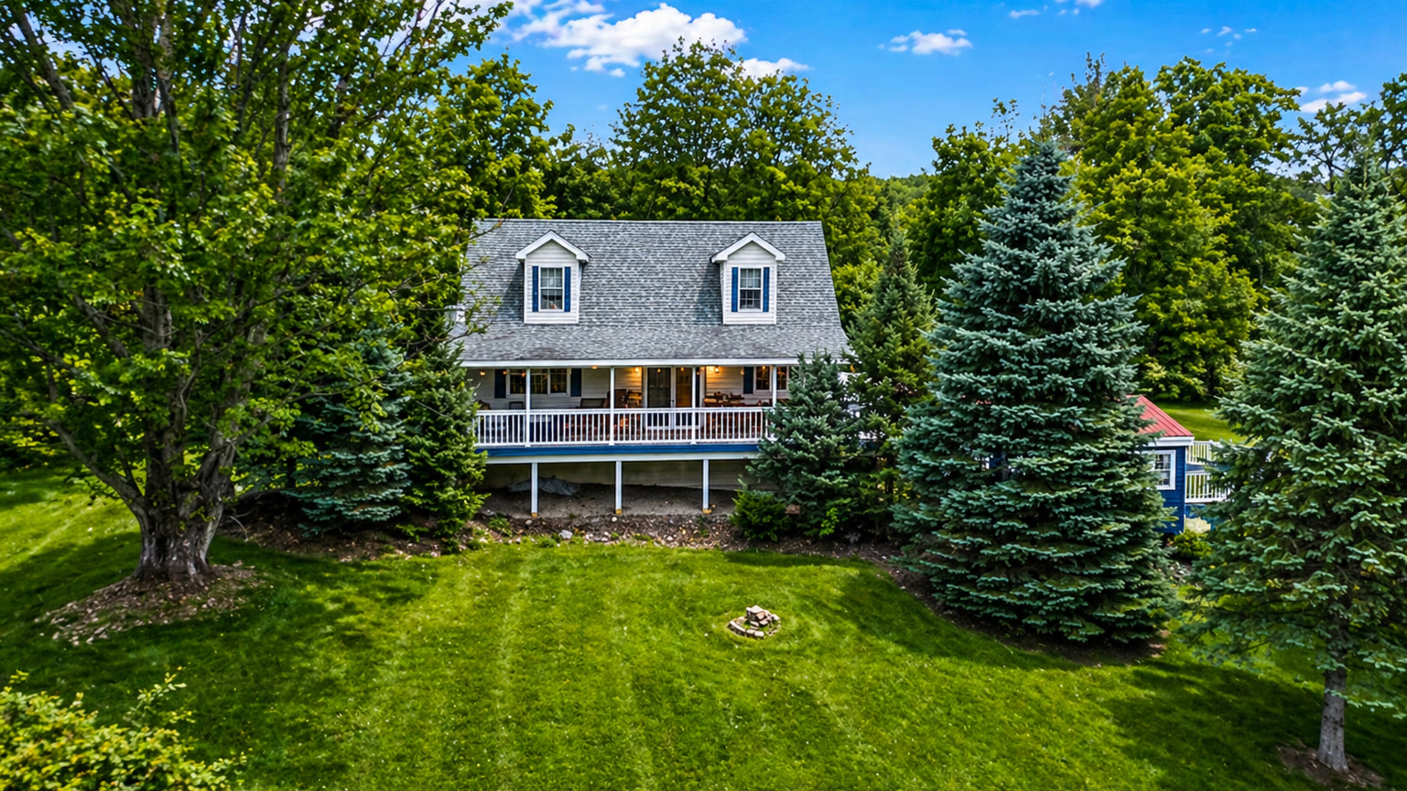 A stunning aerial shot capturing the entire property and its surroundings from above.