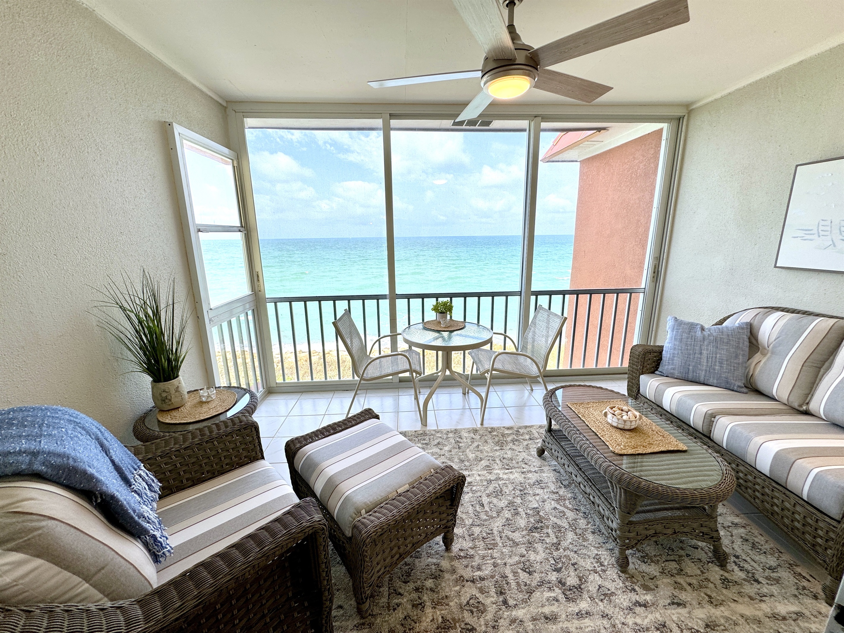Comfortable Lanai with new sliders to beach & Gulf