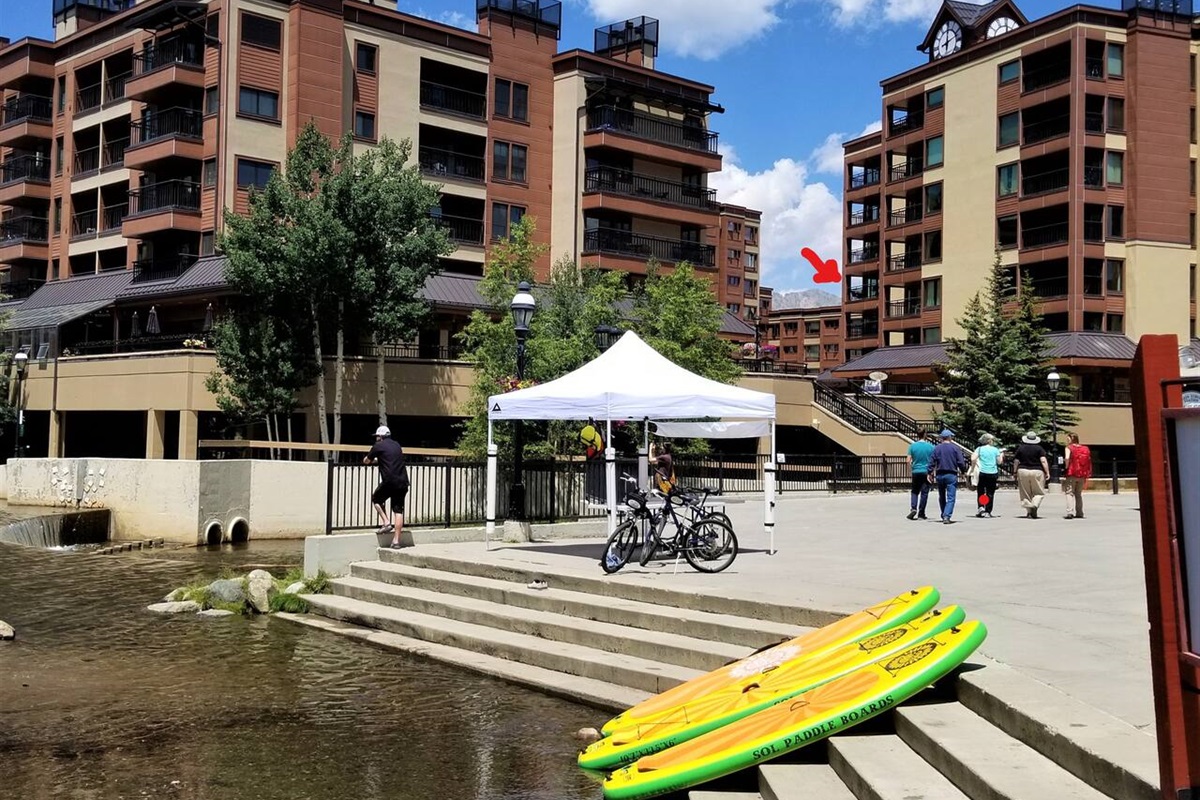 The Maggie Pond Summer Fun: Paddle Boarding, Kayaking, Biking, and Hamster Balls. The Red Arrow is the Condo!