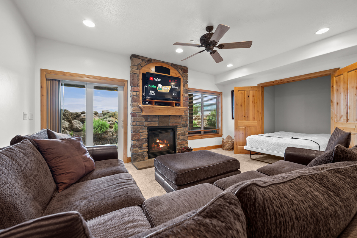 A convenient Murphy bed transforms the family room into additional sleeping space when needed.