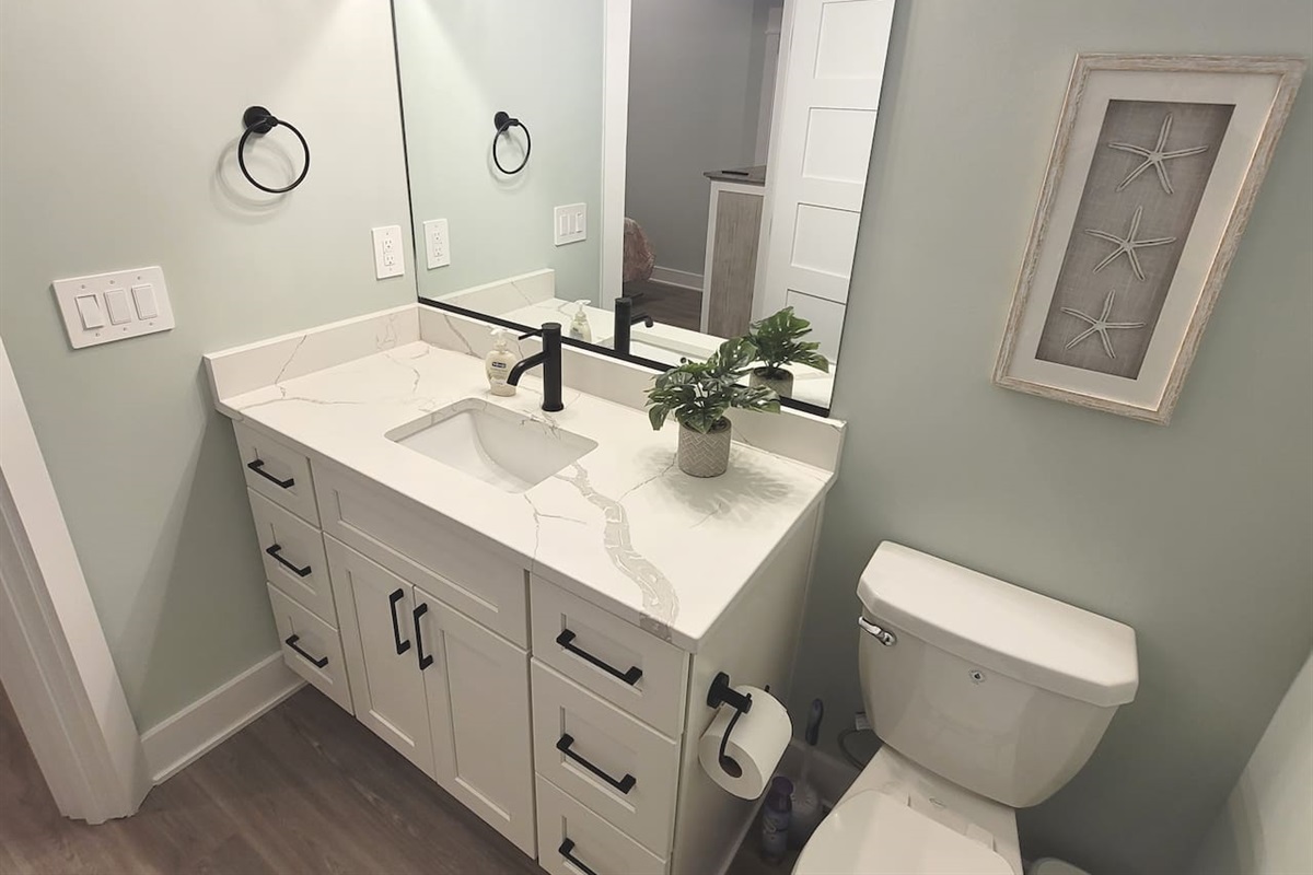 Bright master bathroom.