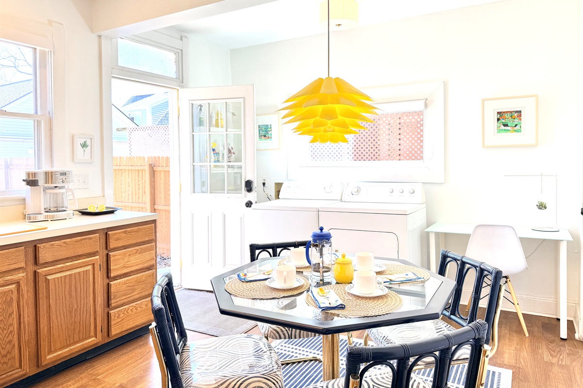 A fully appointed, light-filled kitchen with generous counter space and full-size appliances. A nostalgic eat-in setting perfect for coffee refills, conversation, and unhurried meals.