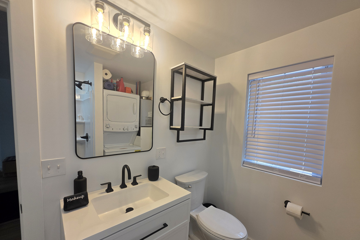 Bathroom vanity with large mirror
