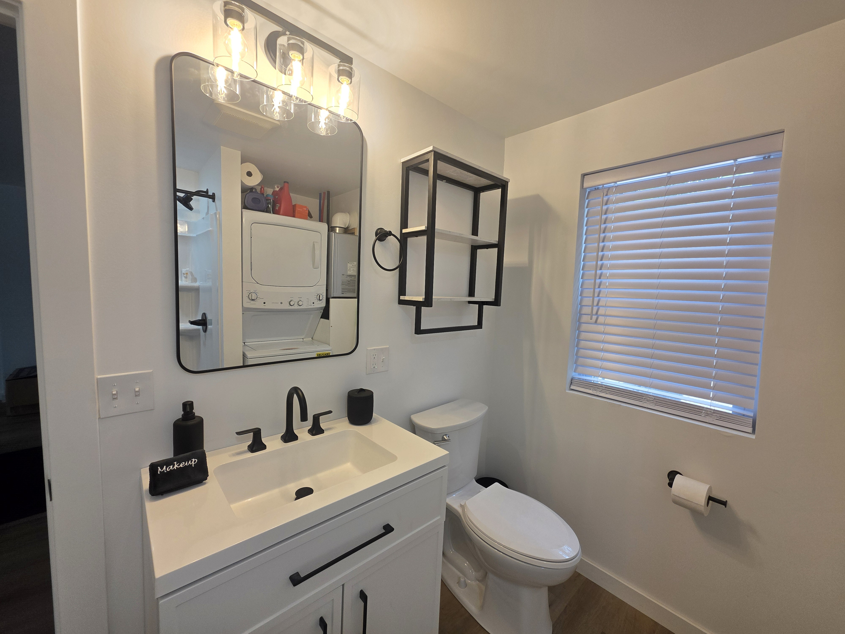 Bathroom vanity with large mirror