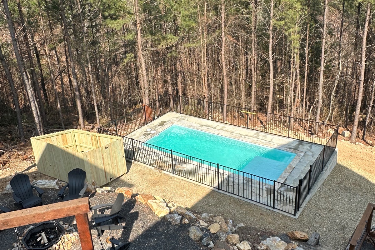 surrounded by towering pines and fresh mountain air, this pool is your perfect escape into serenity.