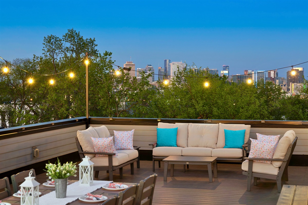 Gather, dine, converse, and hang out on Casa Tiffani’s delightful rooftop surrounded by festive string lights and 360 degree views. Dining table and multiple seating areas, too!