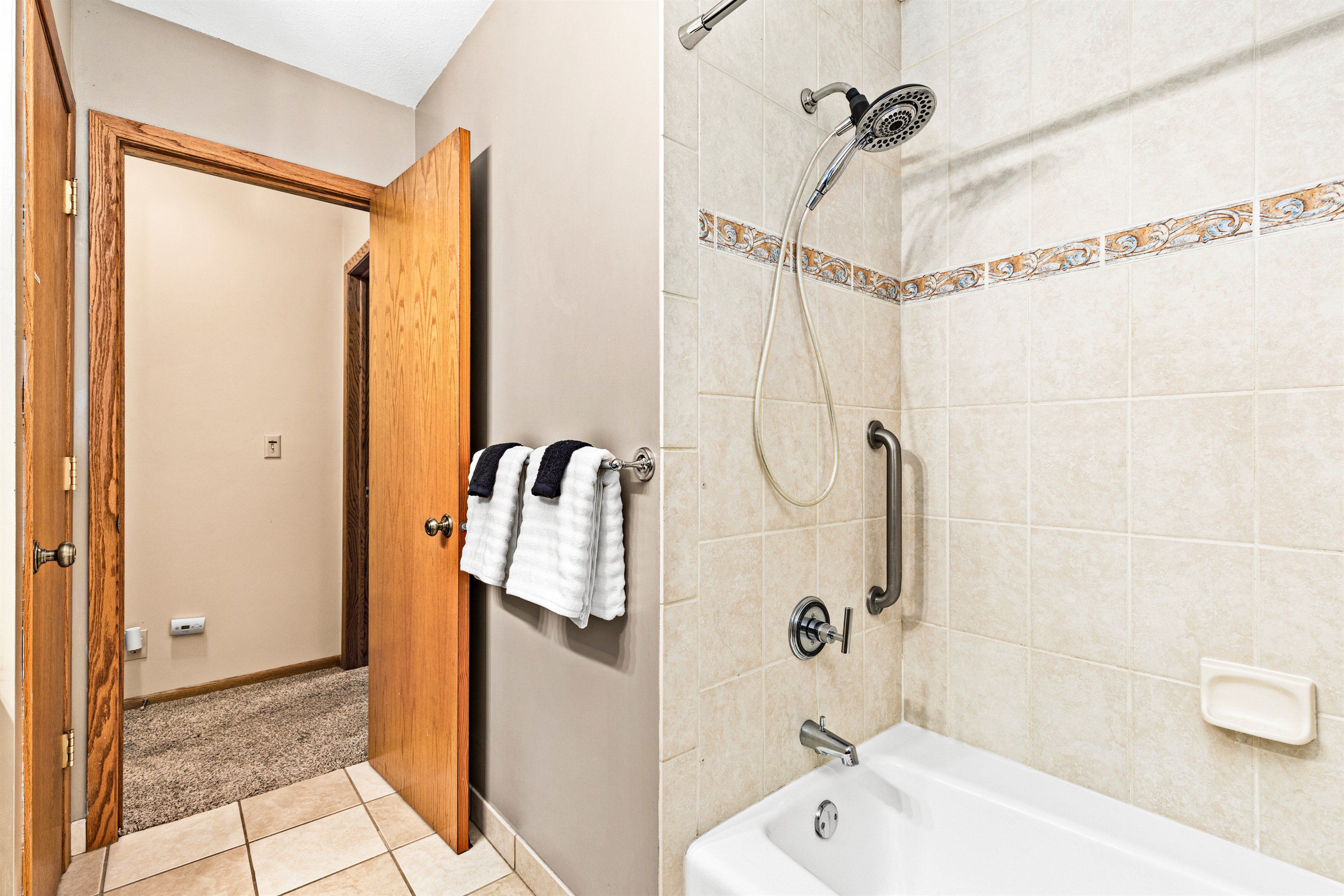 Upstairs bathroom located off the living room.