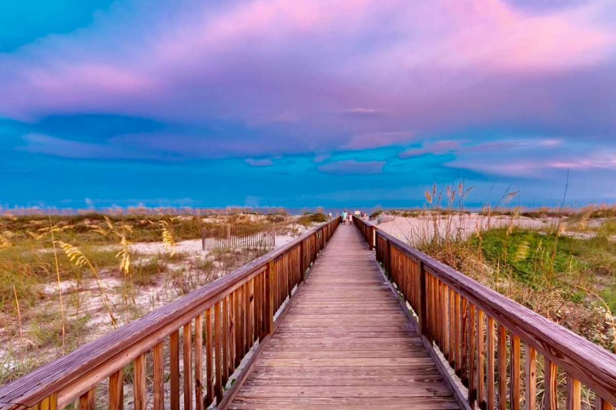 Beach boardwalk at sunset