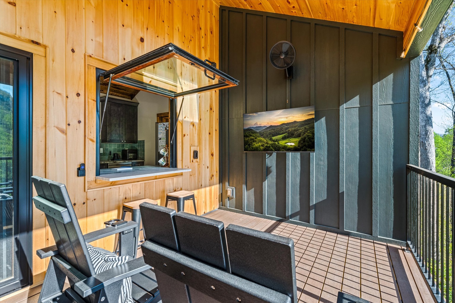 Flip up window provides access to the bar inside the cabin