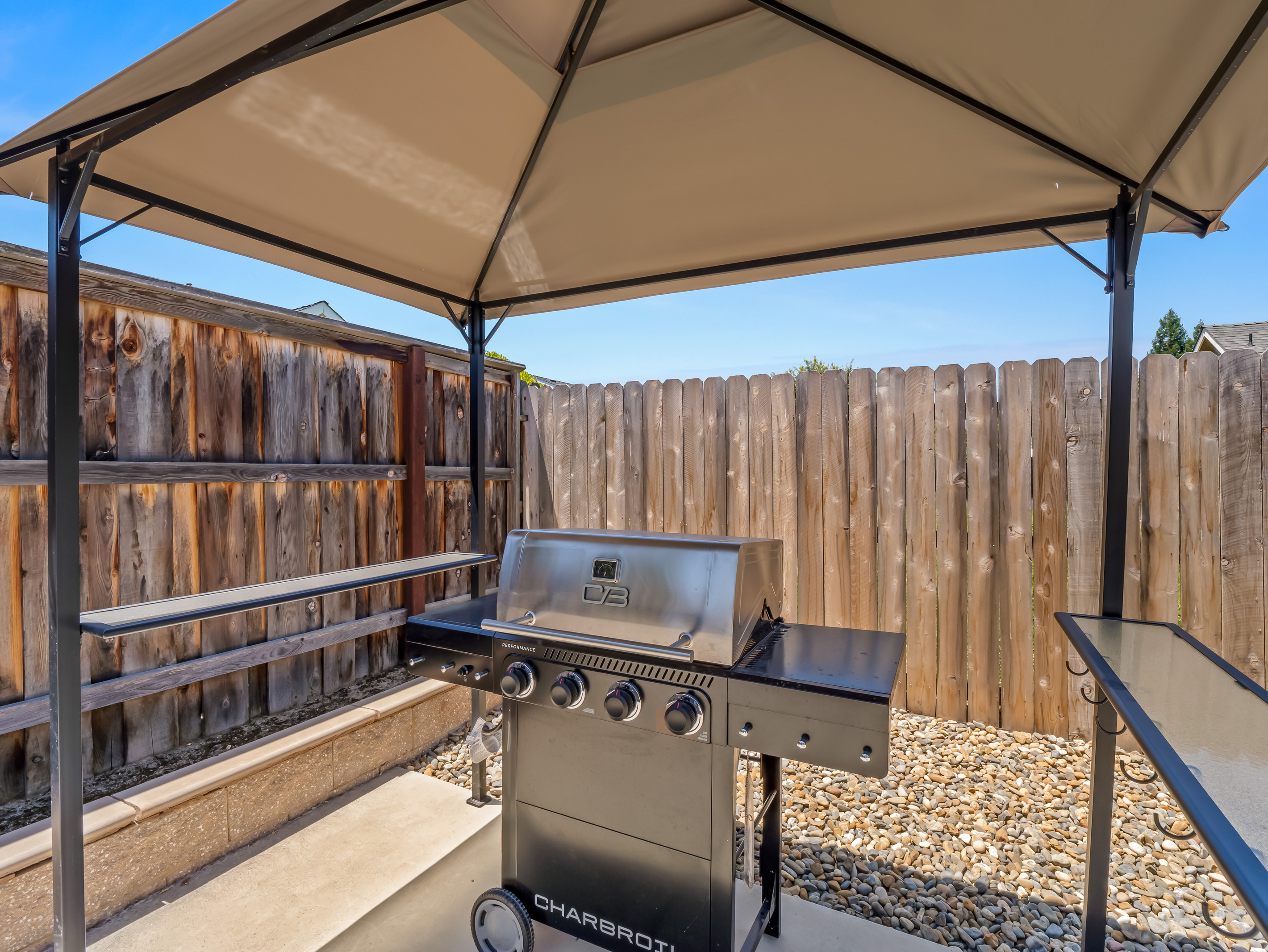 Fire up the BBQ and enjoy outdoor dining in your private backyard retreat. The covered grilling station makes it easy to cook and entertain no matter the season.