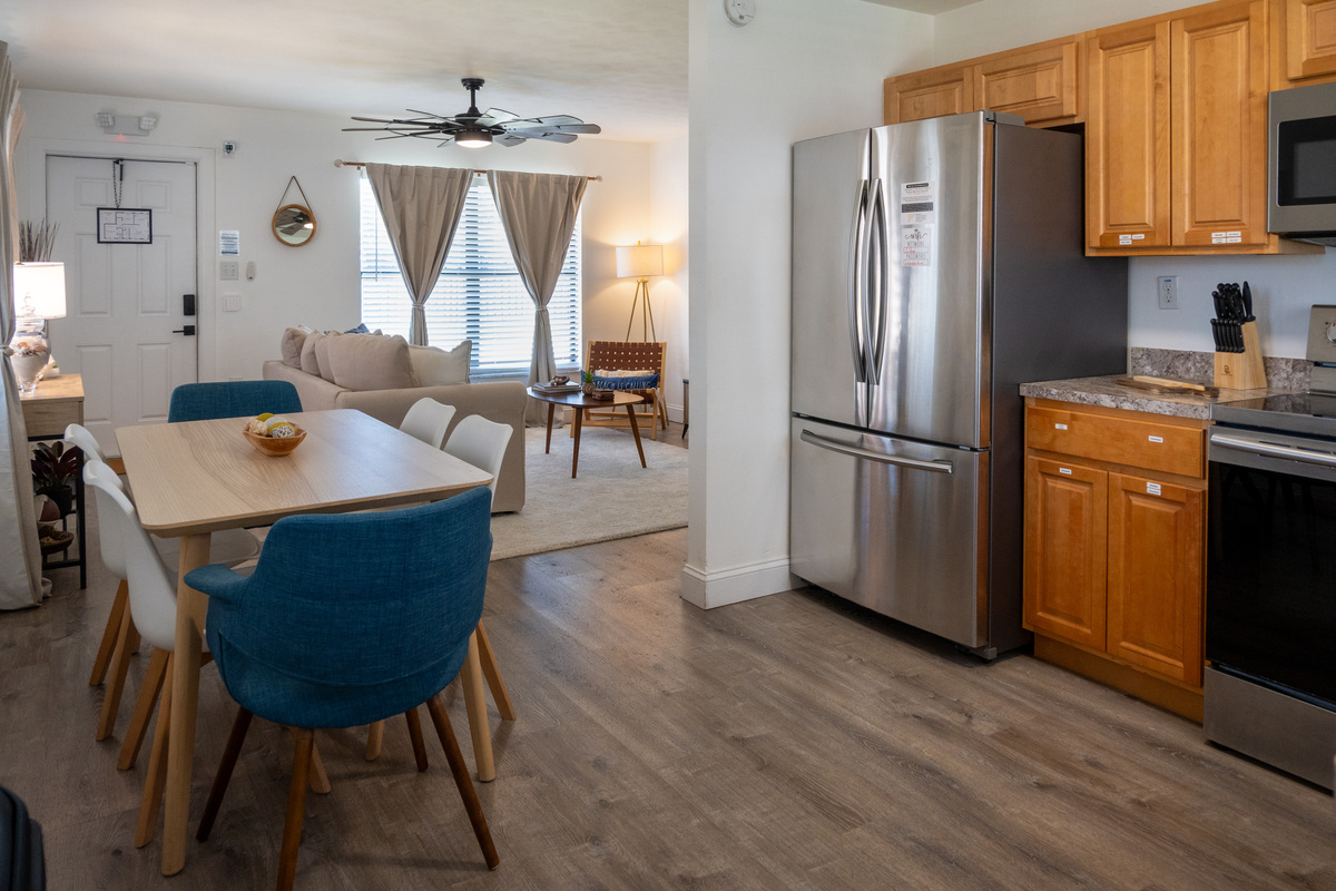 Dining for four between the kitchen and living room