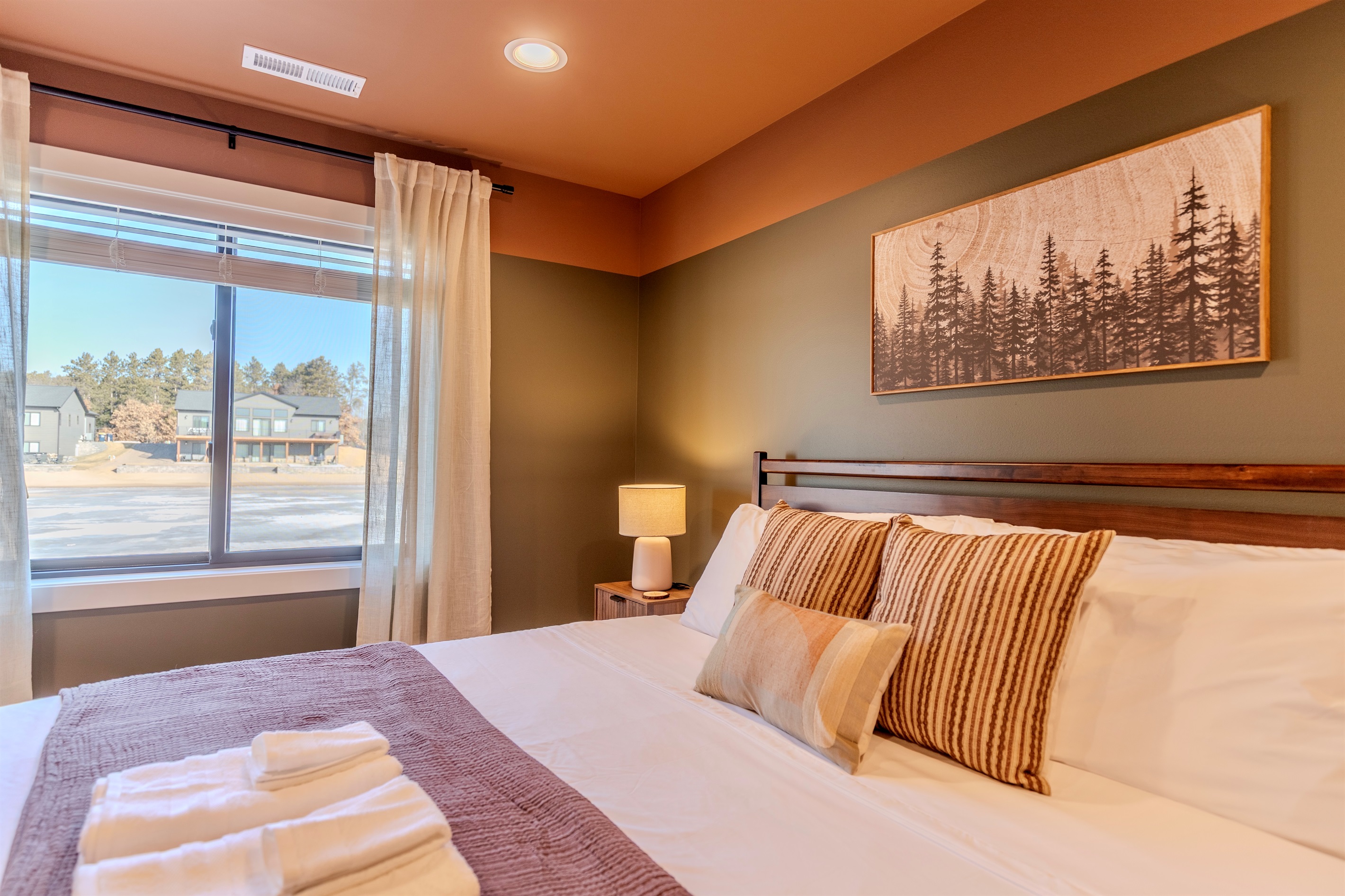 Downstairs king memory foam bedroom with Roku TV.