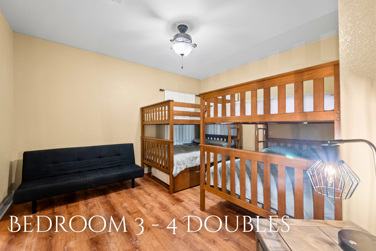 Bedroom 3 with four double bunk beds for groups or kids.