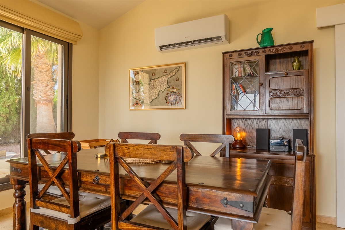 Dining area with a large table that comfortably seats six. Ceiling fan as well as dedicated AC/heating unit. You will also find a bluetooth enabled stereo here.