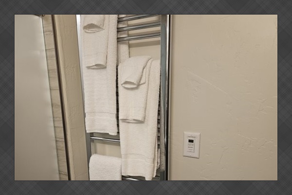 Towel warmer in bathroom.
